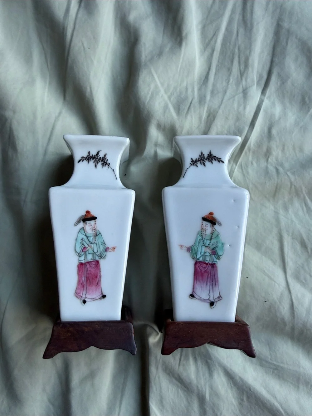 Pair of White Porcelain Vases with Hand-Painted Figures
